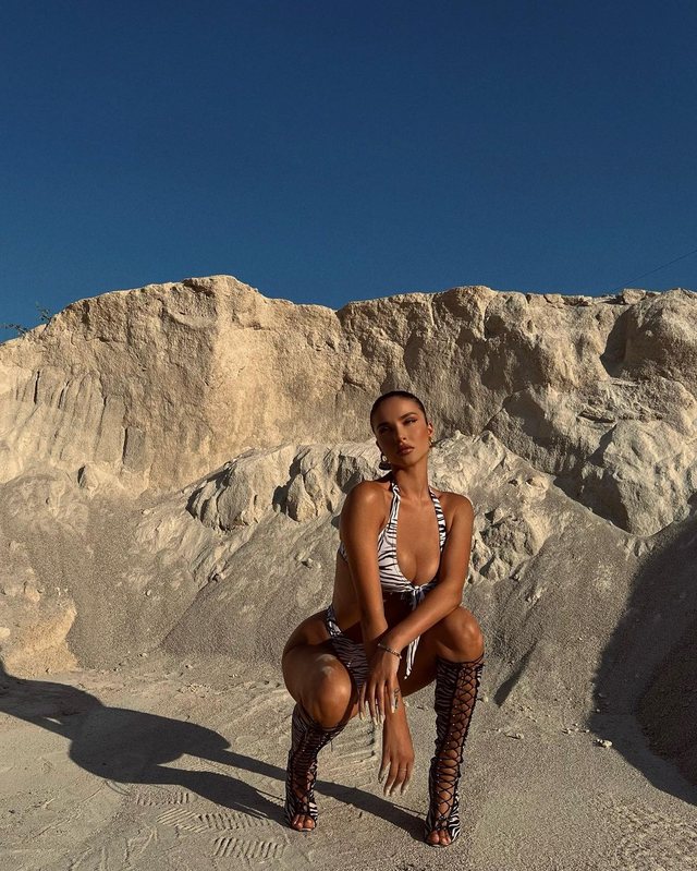 In A Leopard Bikini And Boots Oriola Marashi Crazy Beachgoers With