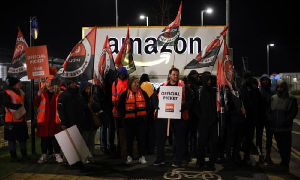 Demanding better conditions and wages, Amazon workers strike on busiest shopping