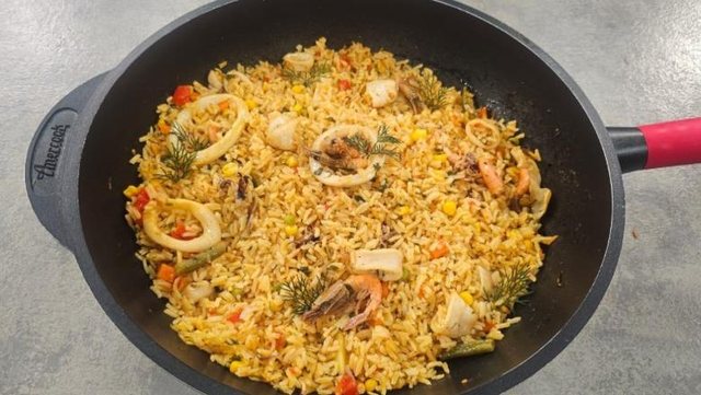 Spanish Paella - Rice with seafood and vegetables