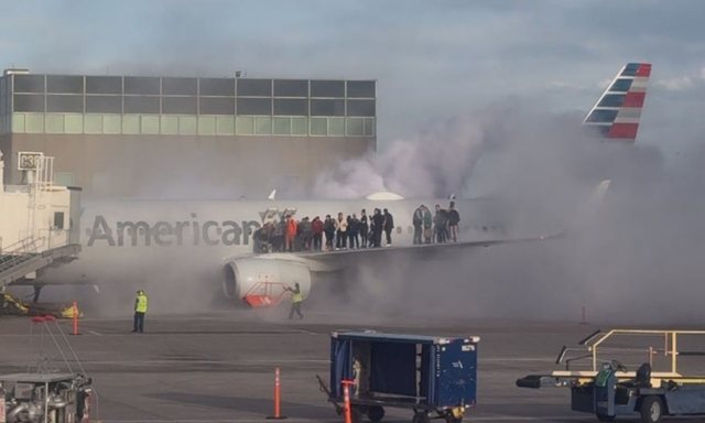 USA/ Plane catches fire after landing, passengers evacuated