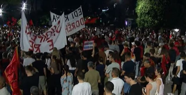 Protesters begin marching in the streets of Tirana