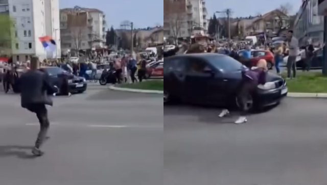 Serbia/ Car plows into crowd, takes away one protester, others rebel