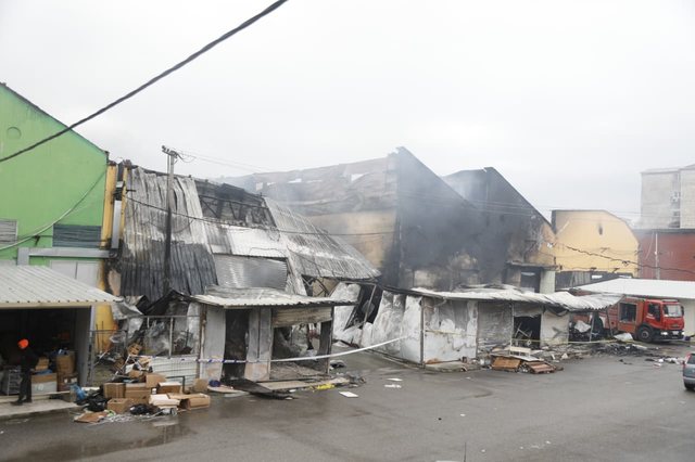 Completely burned shops and ruins, view from the "May 5" market after