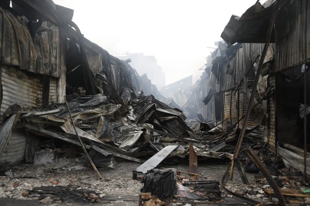 Completely burned shops and ruins, view from the "May 5" market after