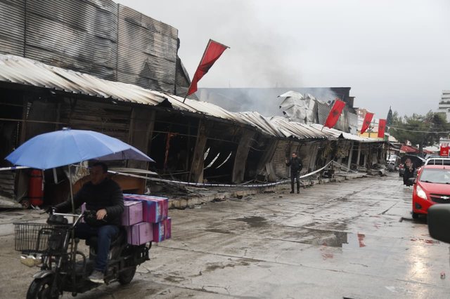 Completely burned shops and ruins, view from the "May 5" market after
