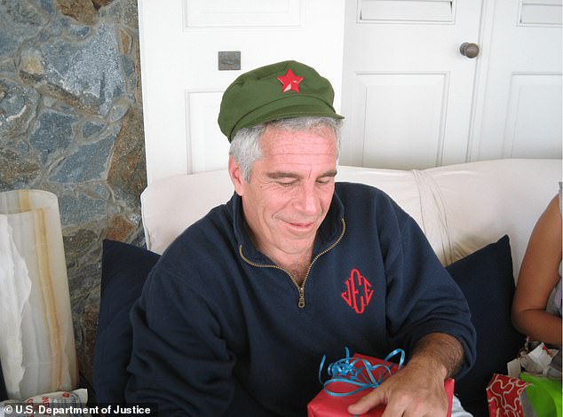 Epstein wearing a communist style cap. American intelligence experts believe Epstein was inducted into the world of espionage via business deals with Robert Maxwell