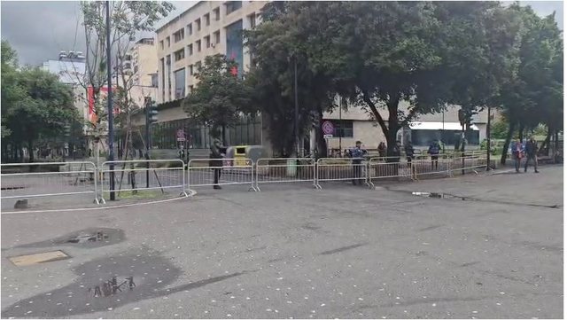 DP protest/Police officers on the ground, metal fence installed
