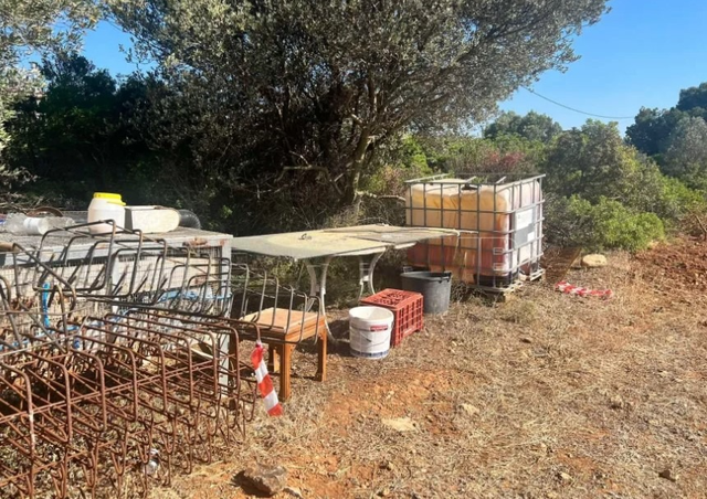 He was executed in the vineyard where he was working, the Greek police identify