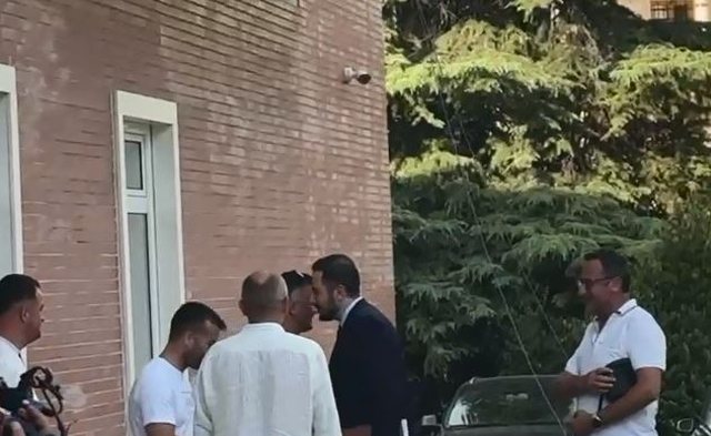Ervin Salianji arrives at the blue headquarters, welcomed by supporters