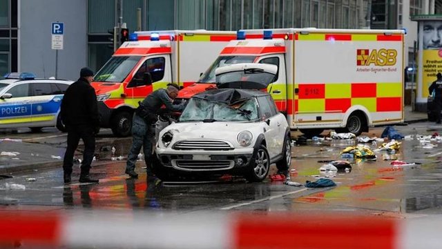 Car runs over group of demonstrators in Munich, 20 injured