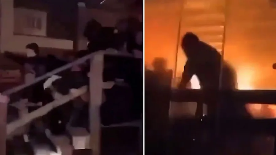 Njer&euml;z q&euml; p&euml;rpiqen t&euml; shp&euml;tojn&euml; nga zjarri,