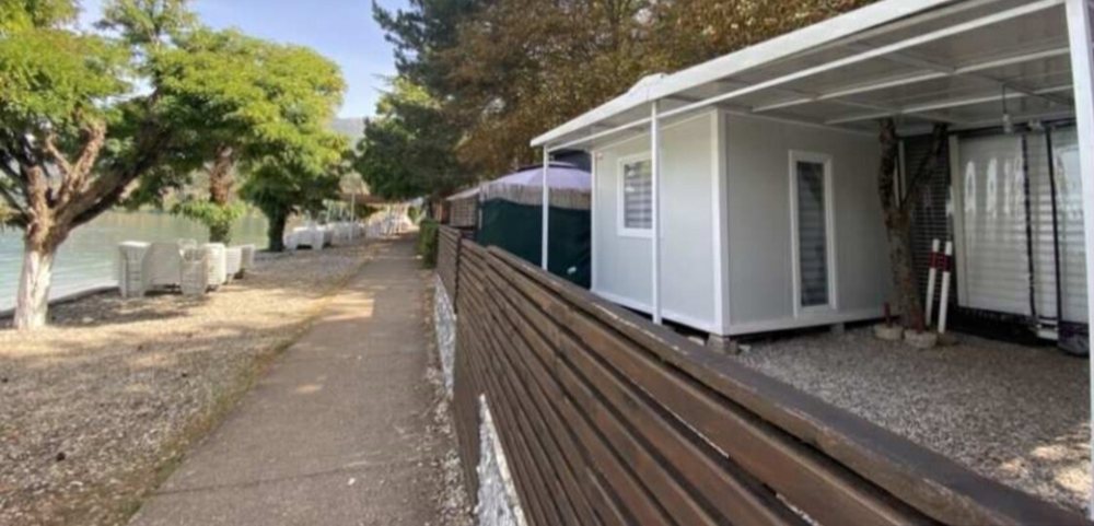 Nd&euml;rtime pa leje n&euml; Oh&euml;r: Kamp-sht&euml;pizat shnd&euml;rrohen