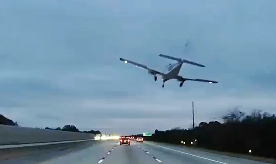 Plane crashes into car on US highway, one injured